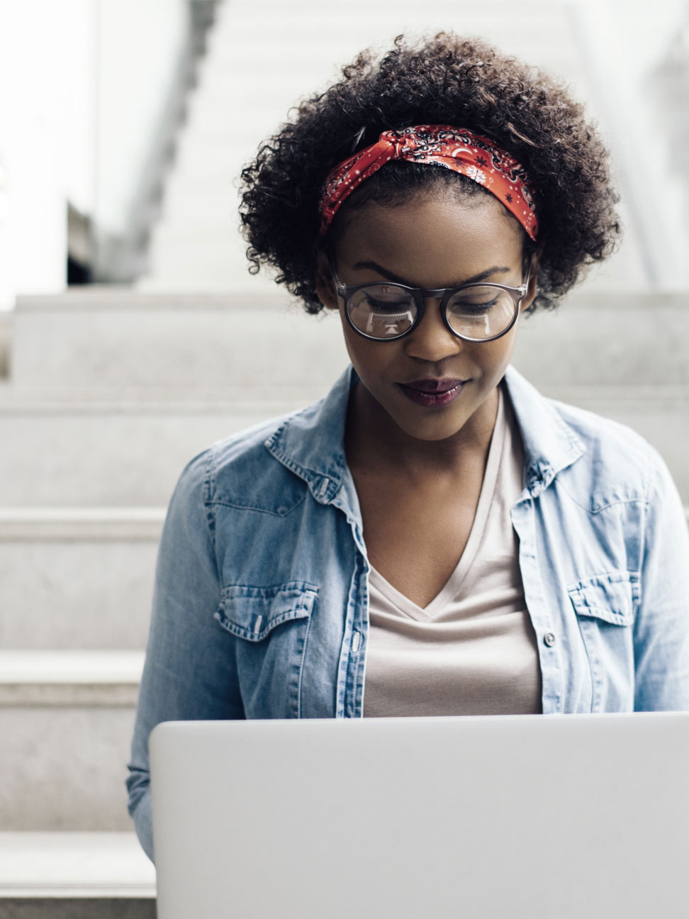 Female professional working on laptop